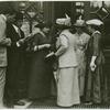 Mrs. Jerome Meller selling 'A Nok' the Hungarian feminist newspaper.