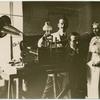 Unidentified woman making a phonograph.
