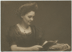 Unidentified woman reading a book