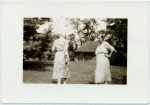 Katherine Devereux Blake (back to camera) and unidentified guest.