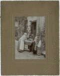 Mrs. Istvan and Family Malonai, Hungarian peasant woman feminist [women washing the clothes]