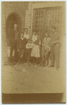 Palthe family group photo, in front of house.