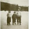 Roth children standing on the snow.