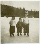 Roth children standing on the snow.