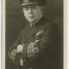 Commander T. L. Mills, O.B.E., R.D., R.N.R.