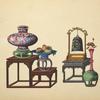 Bi-level table with vase and dish, low small table with hanging bell, vase
