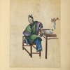 Woman seated at a table, putting on her shoe