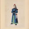 [Man wearing blue and green traditional gown.]