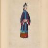 Woman wearing purple tunic with blue trim and pink cuffs