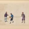 Two guards lead a man bound with chains.