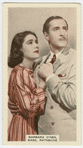 Barbara O'Neil and Basil Rathbone in "The sun never sets."