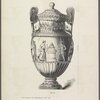 Urn with frieze showing archer with small horse facing a pedestal with a fire