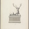 Stag in lying position on pedestal, one hoof forward