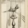 Fountain with multiple spouts attached to central dolphin figure