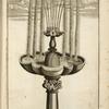 Fountain with scalloped basin and multiple spouts mounted on central organic shape