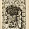 Grotto with sculpture of young boy and two dogs