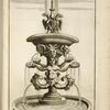 Fountain with sculptures of sea gods holding shells, animal heads, and eagles