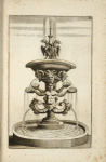 Fountain with sculptures of sea gods holding shells, animal heads, and eagles