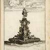 Fountain with elaborate central sculpture including allegorical figures and sea monsters.