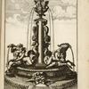 Fountain with sculptures of sphinxes, sea gods, nude women, and demonic faces.