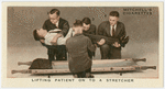 Lifting patient on to stretcher.