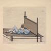 Man laying on platform with head in wooden collar