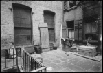 Tenement backyard (1903).