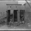 Three Outhouses (dirty) and laundry and tree (1904).