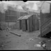 Outhouses and blurred laundry (1904).
