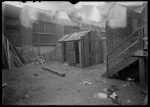 Outhouses and blurred laundry (1904).