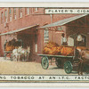 Unloading tobacco at an I.T.C. factory.