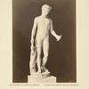Nude man with wings on head, holding stick