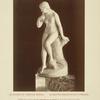 Nude woman sitting on tree trunk