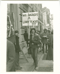 GAA Board of Education zap. Man with sign: Was Socrates a lousy teacher?