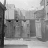 Backyard with laundry and outhouses