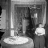 Interior of room with woman & furniture