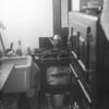 Kitchen with stove, sink, ice-box, coffee pot