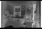 Inhabited room with stove, tubs, beds