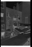 Tenement backyard with ice wagon