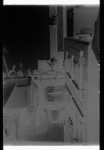 Kitchen with stove, sink, ice-box, coffee pot
