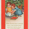 Girls playing by Christmas tree