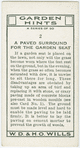 A paved surround for the garden seat.