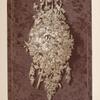 A group of flowers craved in wood by Wallis of Louth in Lincolnshire.
