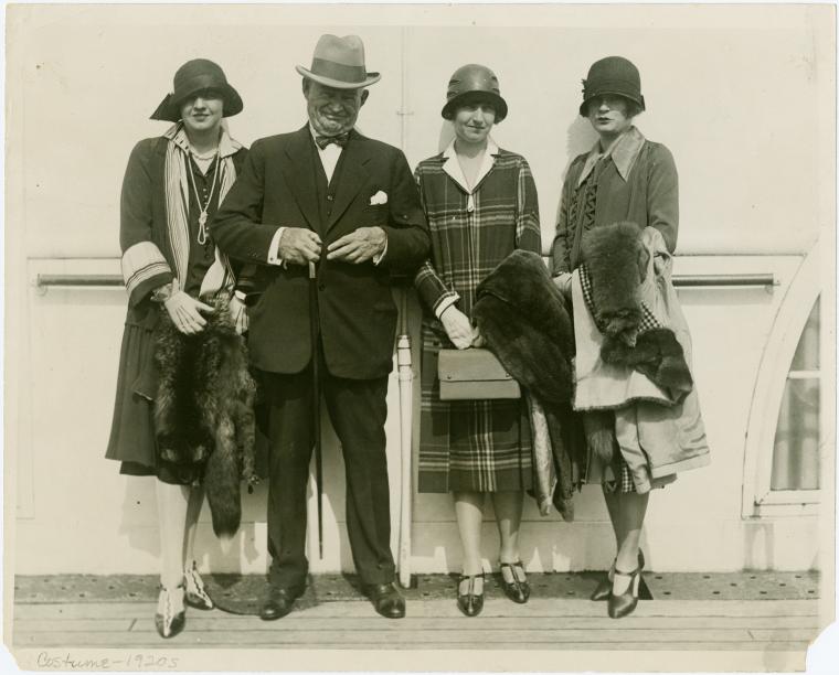 Mr. William J. Conners, Buffalo political boss, posed with three women ...