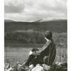 Woman overlooking a mountain scene