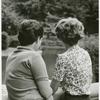 Two women overlooking a creek