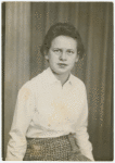 Marion Glass portrait with curtain