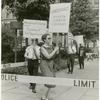 Barbara Gittings picketing behind a police barrier