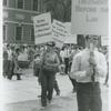Woman with belt in picket line