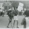 Women picketing while holding hands, original